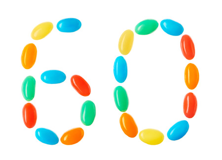 60 number made of multicolored candies isolated on white backgroundの写真素材