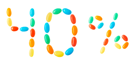 40% lettering made of multicolored candies isolated on white backgroundの写真素材