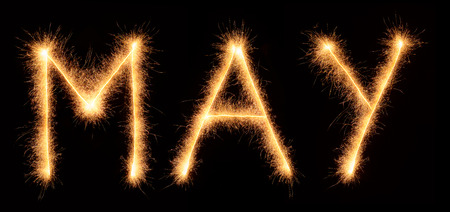 May lettering drawn with bengali sparkles isolated on black backgroundの写真素材