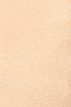 Beach sand. Summer beach background. View from aboveの写真素材