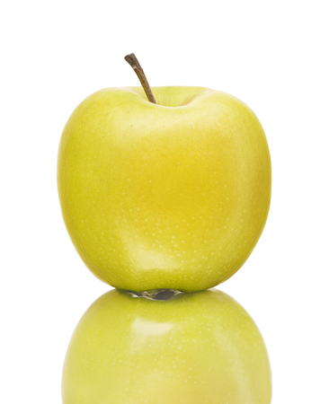 Green apple with reflection isolated on white background.の写真素材