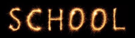 School lettering drawn with bengali sparkles isolated on black backgroundの写真素材