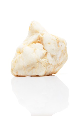 White mineral stone with reflection isolated on white backgroundの写真素材
