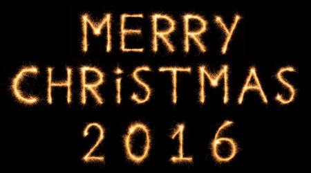 MERRY CHRISTMAS 2016 lettering drawn with bengali sparkles isolated on black backgroundの写真素材