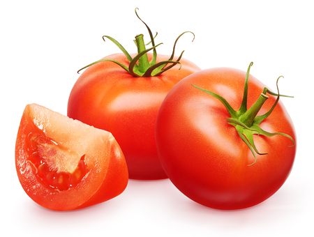 Two whole fresh red tomatoes with green leaves and slice isolated on white backgroundの写真素材