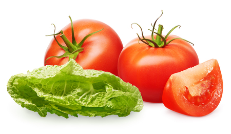 Two whole fresh red tomatoes with green leaves, slice and green salad isolated on white backgroundの写真素材
