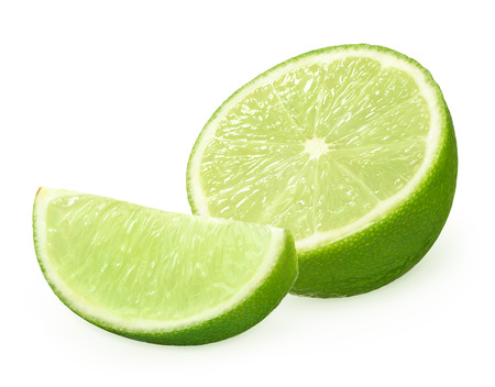 Half and slice of fresh lime fruit isolated on white backgroundの写真素材