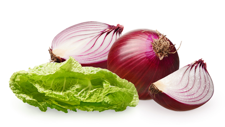 Whole fresh unpeeled red onion with half and slice near green salad isolated on white backgroundの写真素材