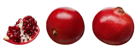 Section and whole fresh pomegranate fruit at different angles isolated on white backgroundの写真素材