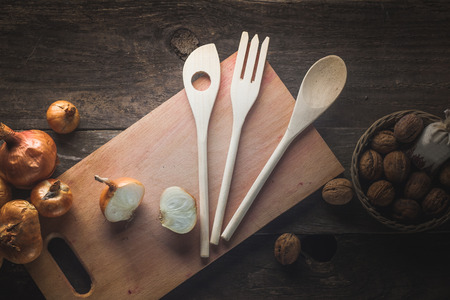 The photo shows the jars of spices, which lie on a wooden tableの写真素材
