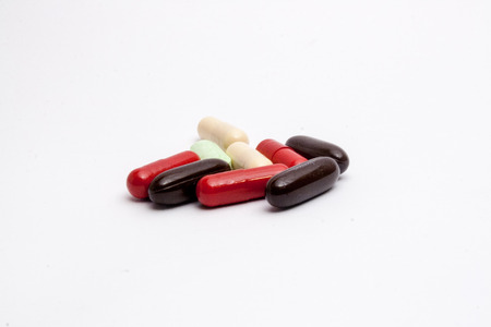 different colors pillsの写真素材