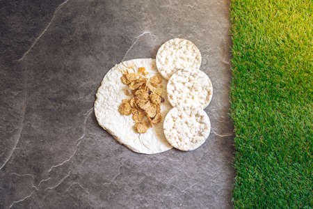 Still life of healthy food products. Colored dishes with food on the background of a stone...