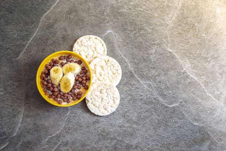 Still life of healthy food products. Colored dishes with food on the background of a stone countertopの写真素材