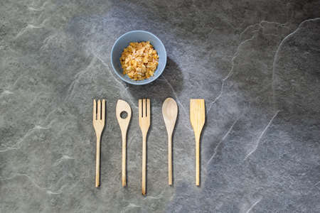 Various crockery on a dark marble top. Photos are made on a dark backgroundの写真素材