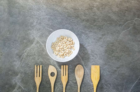 Various crockery on a dark marble top. Photos are made on a dark backgroundの写真素材