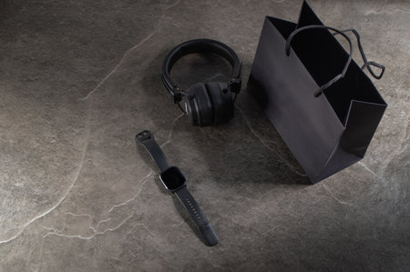 gadgets, on a dark background, with a stone structure, and subdued lightingの写真素材