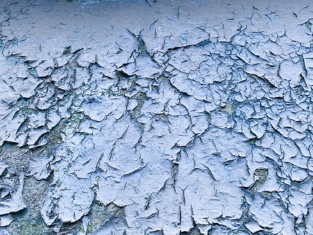 retro texture of old paint that is cracked on the surfaceの写真素材