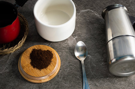 coffee and coffee accessories on stone table backgroundの写真素材