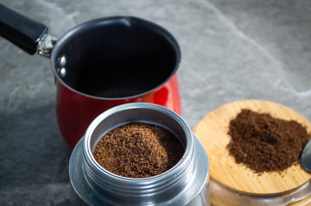 coffee and coffee accessories on stone table backgroundの写真素材