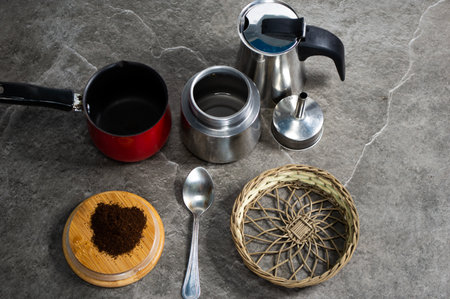 coffee and coffee accessories on stone table backgroundの写真素材