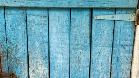 Texture of vintage doors painted with old paintの写真素材
