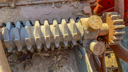 old mechanism for processing wood, with peeling paintの写真素材