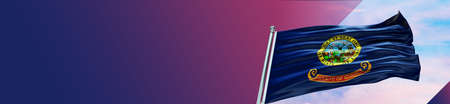 State of Idaho flag waving in the wind on flagpole. 3d illustration.の写真素材