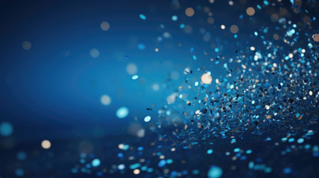 3d render of abstract bokeh particles on blue background.の素材
