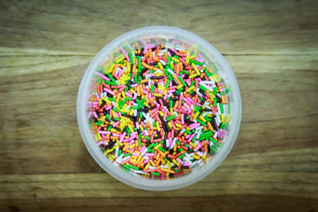 Sweet Candy color full, Top view on wooden tableの写真素材