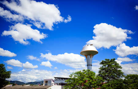 Water tower under cloudy sky, water storage at Thailandのeditorial素材