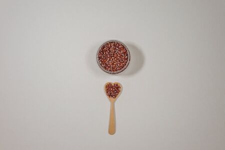 minimal style wooden bowl  red beans with wooden spoon beansの写真素材