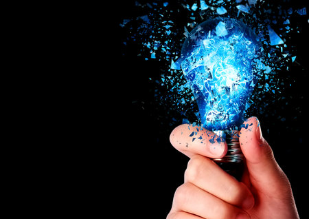 3d illustration of a glowing blue light bulb held in the hand with the concept of science technologyの写真素材