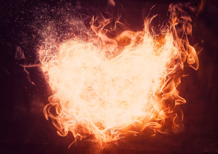 3d illustration of exploding heart shaped flameの写真素材