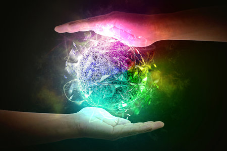 3d illustration of colorful glowing spheres between palms in energy conceptの写真素材