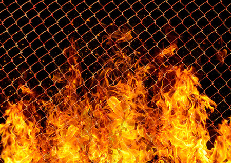 3d illustration of burning flames and burnt metal fence