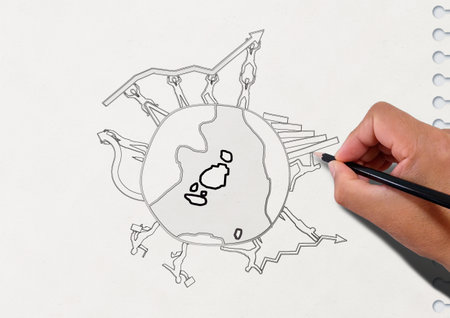 Hand drawing a business doodle on a white sheet of paperの写真素材