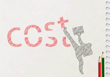 Hand writing the word COST on a white sheet of paper.
