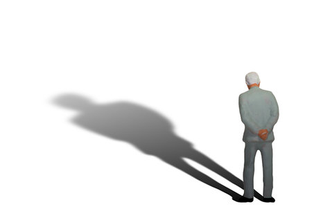 3D rendering of a man with a shadow on a white backgroundの写真素材