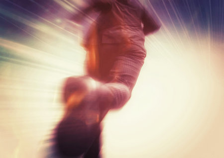 Businessman running with high speed on light rays background.の写真素材