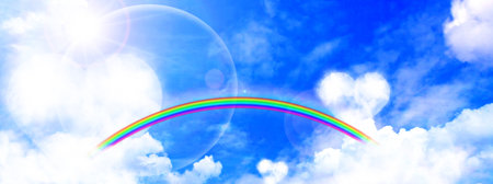 Blue sky background with clouds and rainbow. Panoramic image.の写真素材