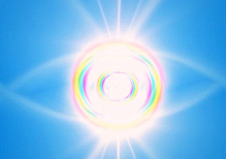 sun with lens flare and bokeh effect on blue sky backgroundの写真素材