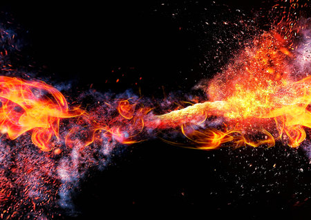 Fire flames with sparks on a black background.の写真素材