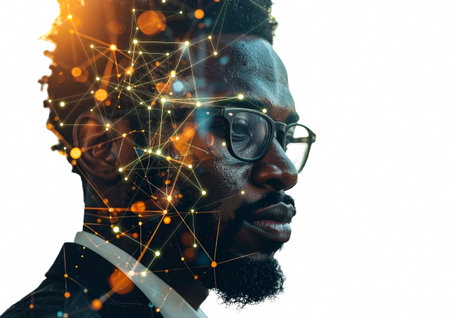 Futuristic technologies. Side view of handsome young African man in eyeglasses looking away while standing against white backgroundの素材