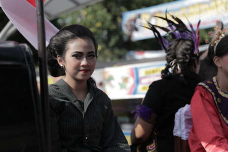 Indonesian Girl Traditional Java Music Instrument Culture Carnivalのeditorial素材