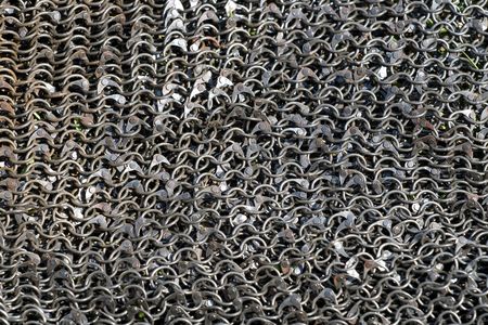 Background of medieval armour made from metal rings の写真素材