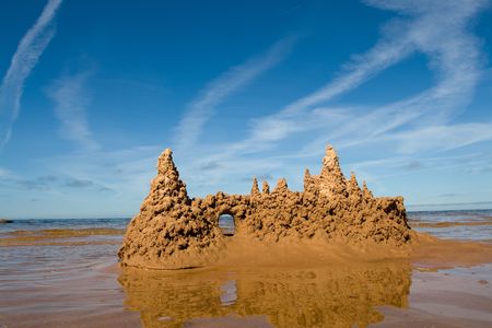 Towers of sand castle at the seasideの写真素材