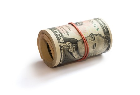 A roll of dollars isolated on white background