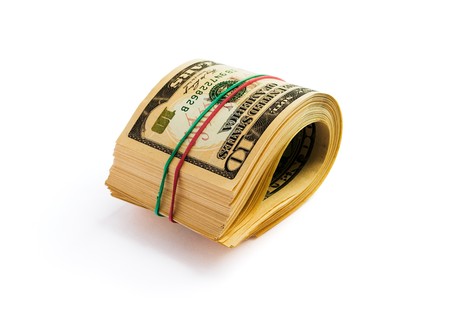 A roll of dollars isolated on white background with clipping pathの写真素材