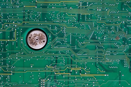 Part of an old green circuit board の写真素材