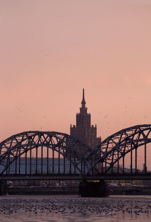 Railway bridge over river Daugava in Riga, Latviaの写真素材